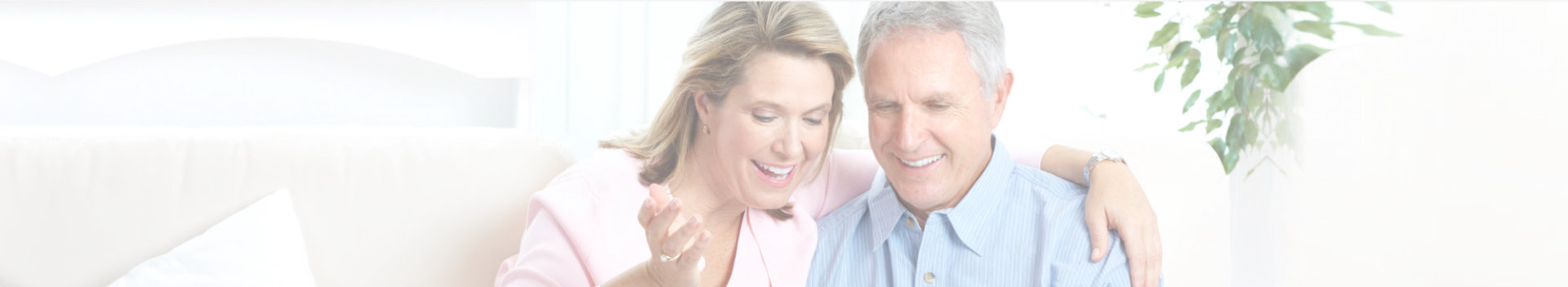 elderly couple smiling